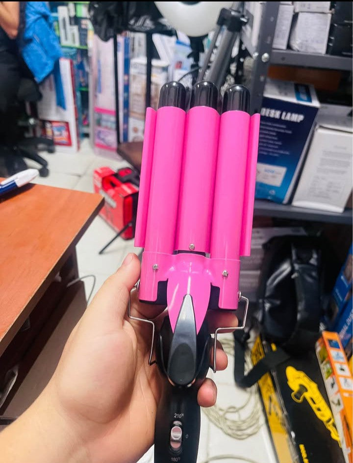 Pinza Waver con cabello rizado